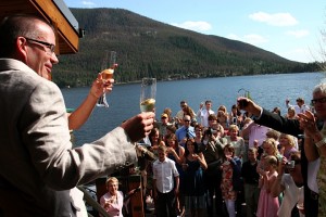 A toast with the bride & groom on the deck at Western Riviera Lakeside Venue